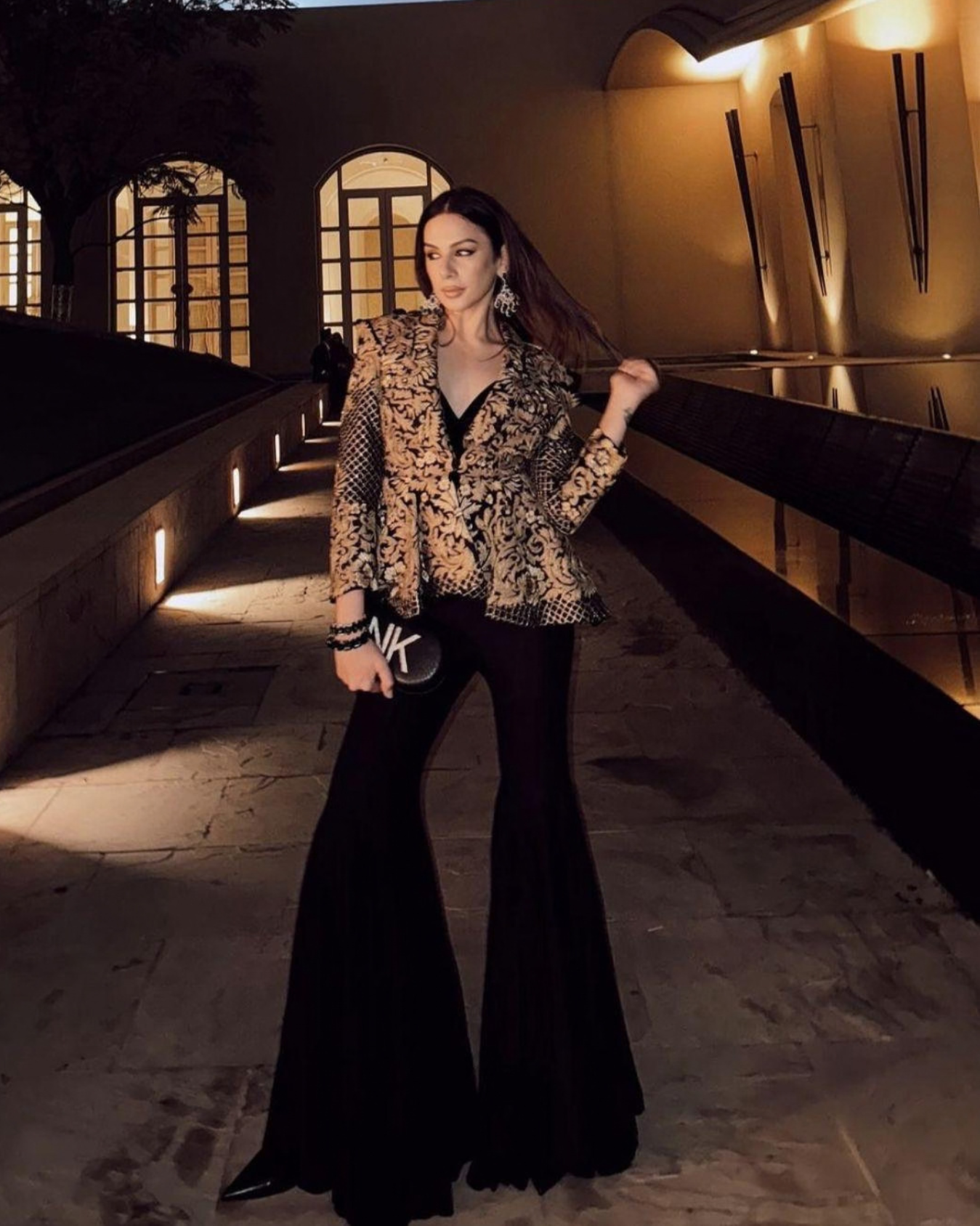 Nitibha Kaul in Zoe black peplum jacket