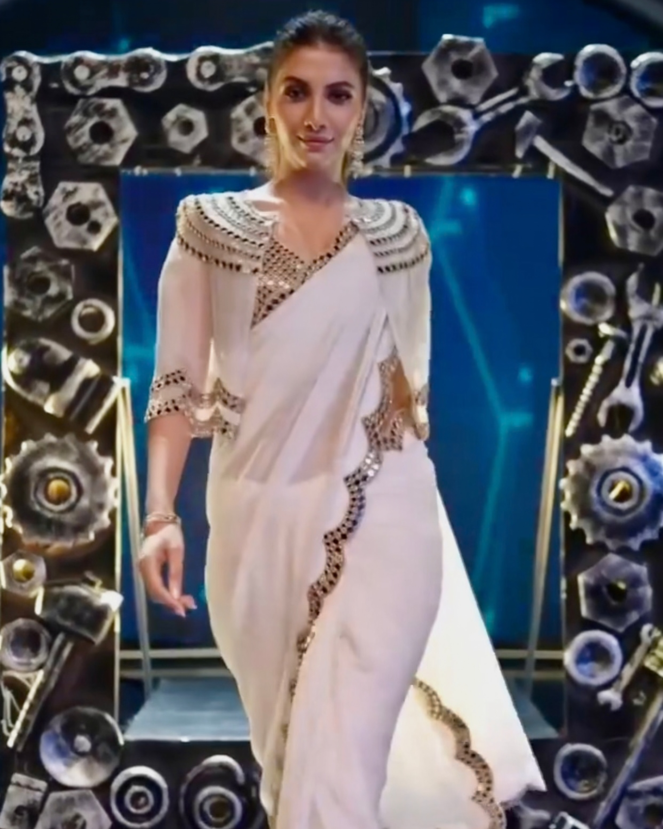 Rukmini Maitra in ivory pre draped mirror cape saree
