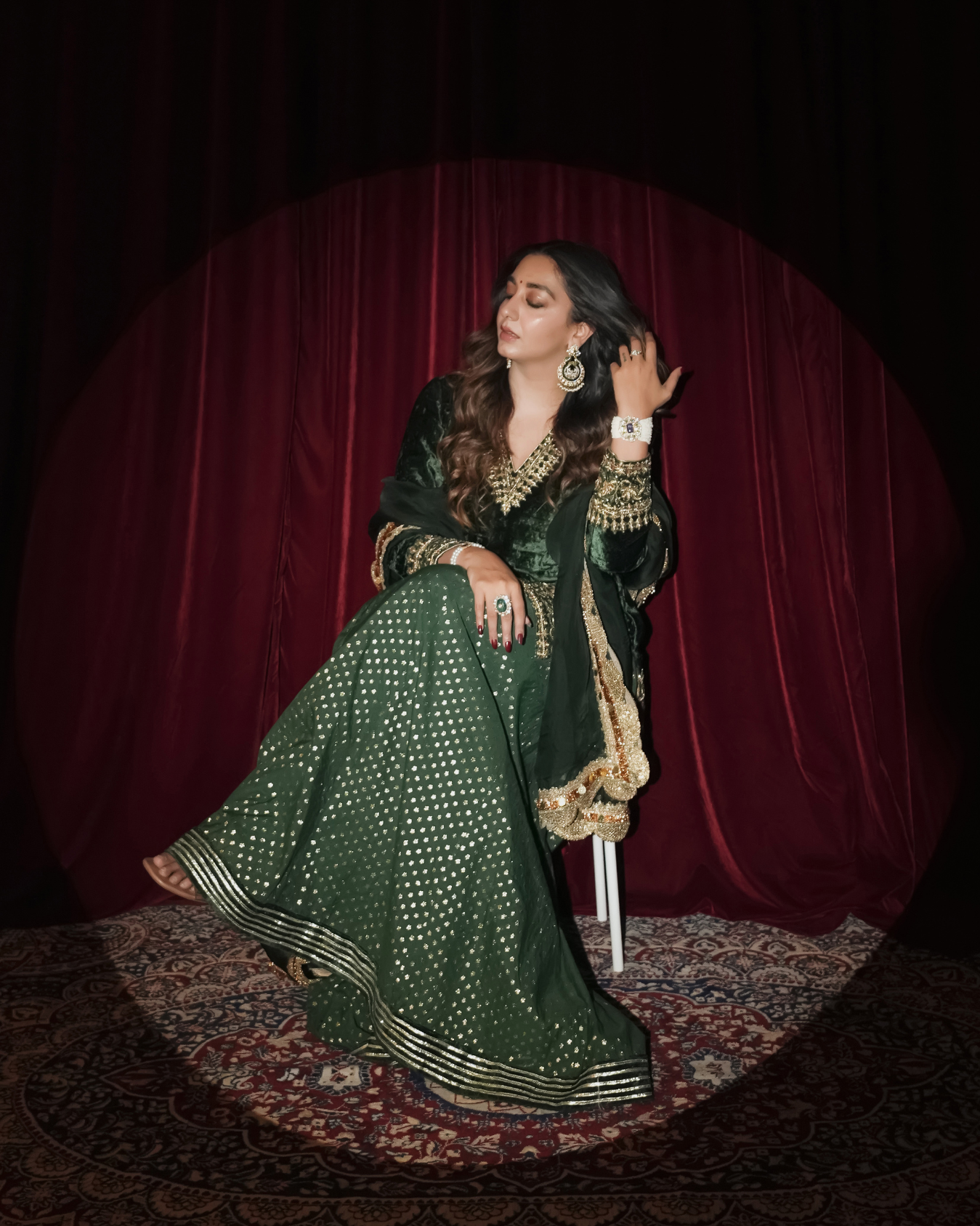 SHIANA KOTHARI in Bottle green velvet suit set