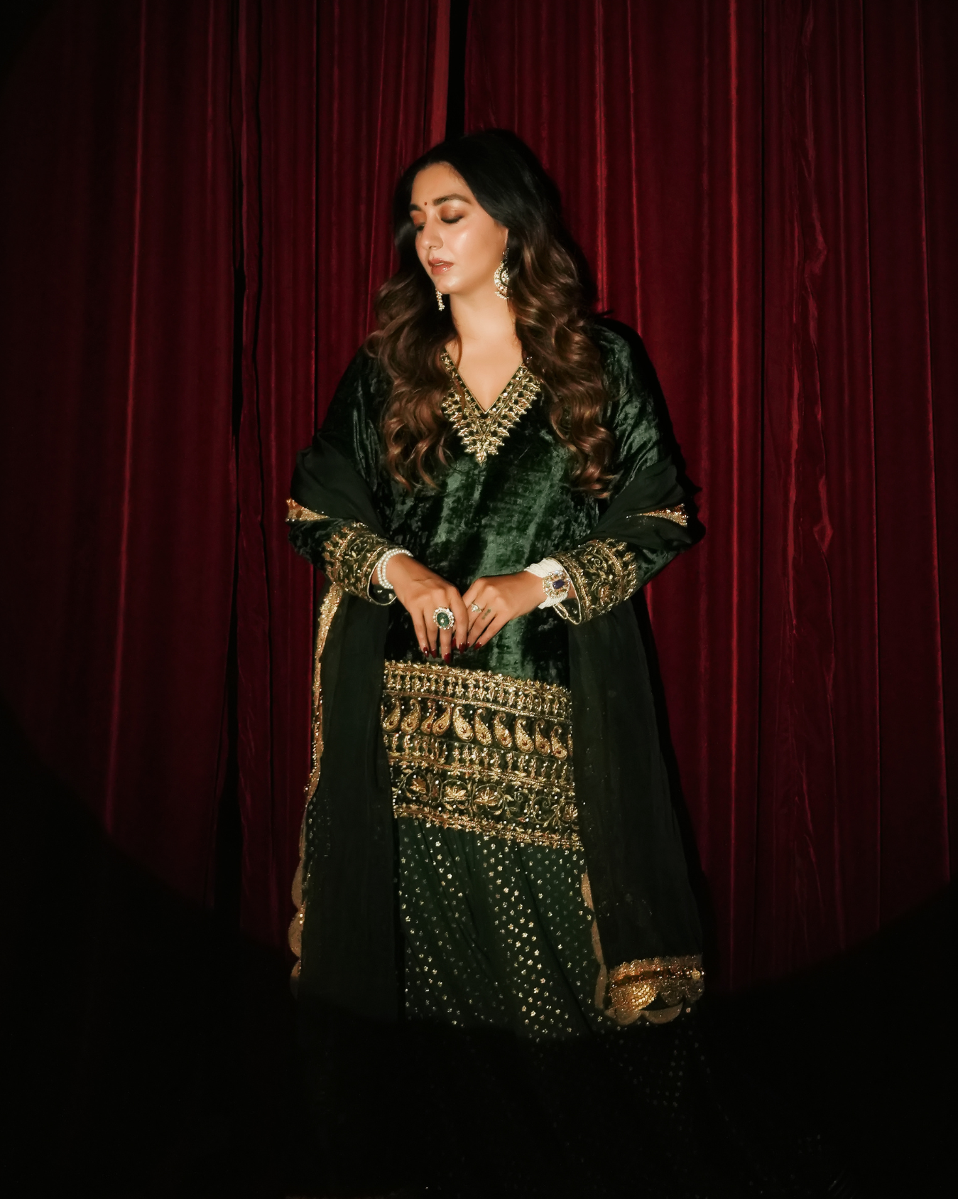 SHIANA KOTHARI in Bottle green velvet suit set
