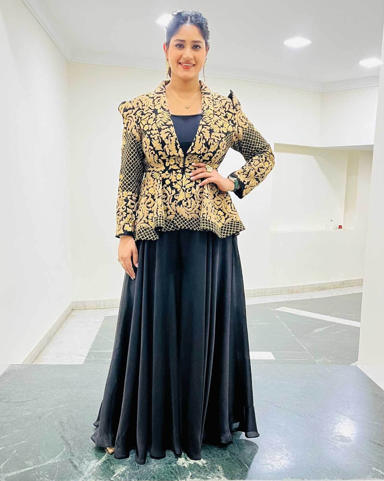 PRATIBHA SINGH in Zoe black peplum jacket set.