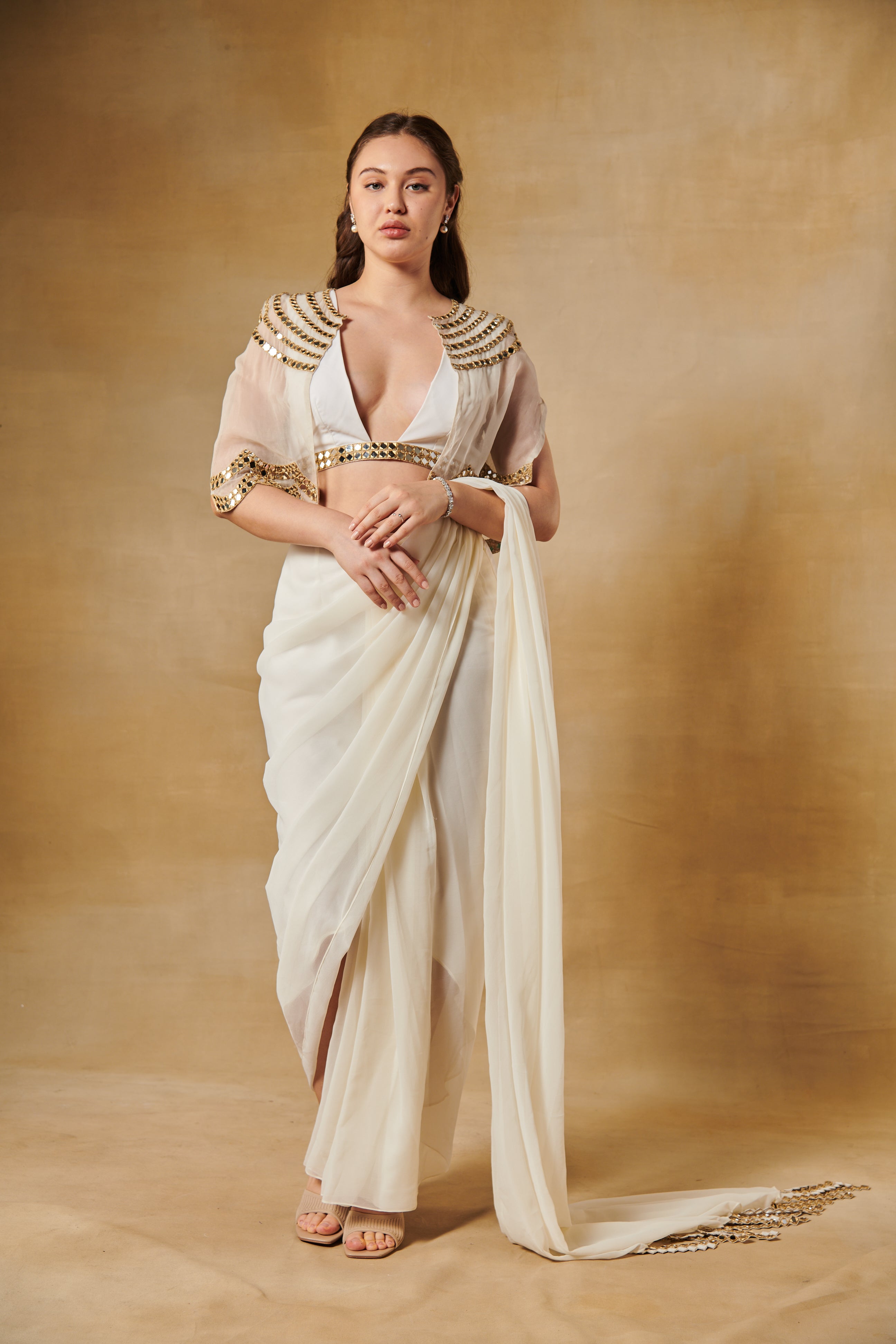 Rukmini Maitra in ivory pre draped mirror cape saree