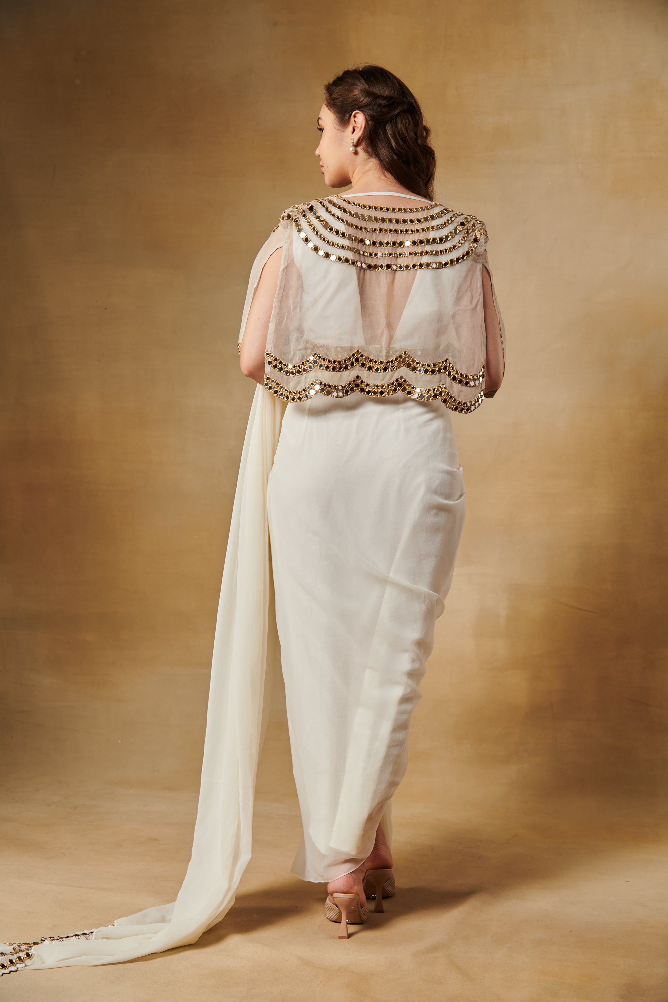 Rukmini Maitra in ivory pre draped mirror cape saree