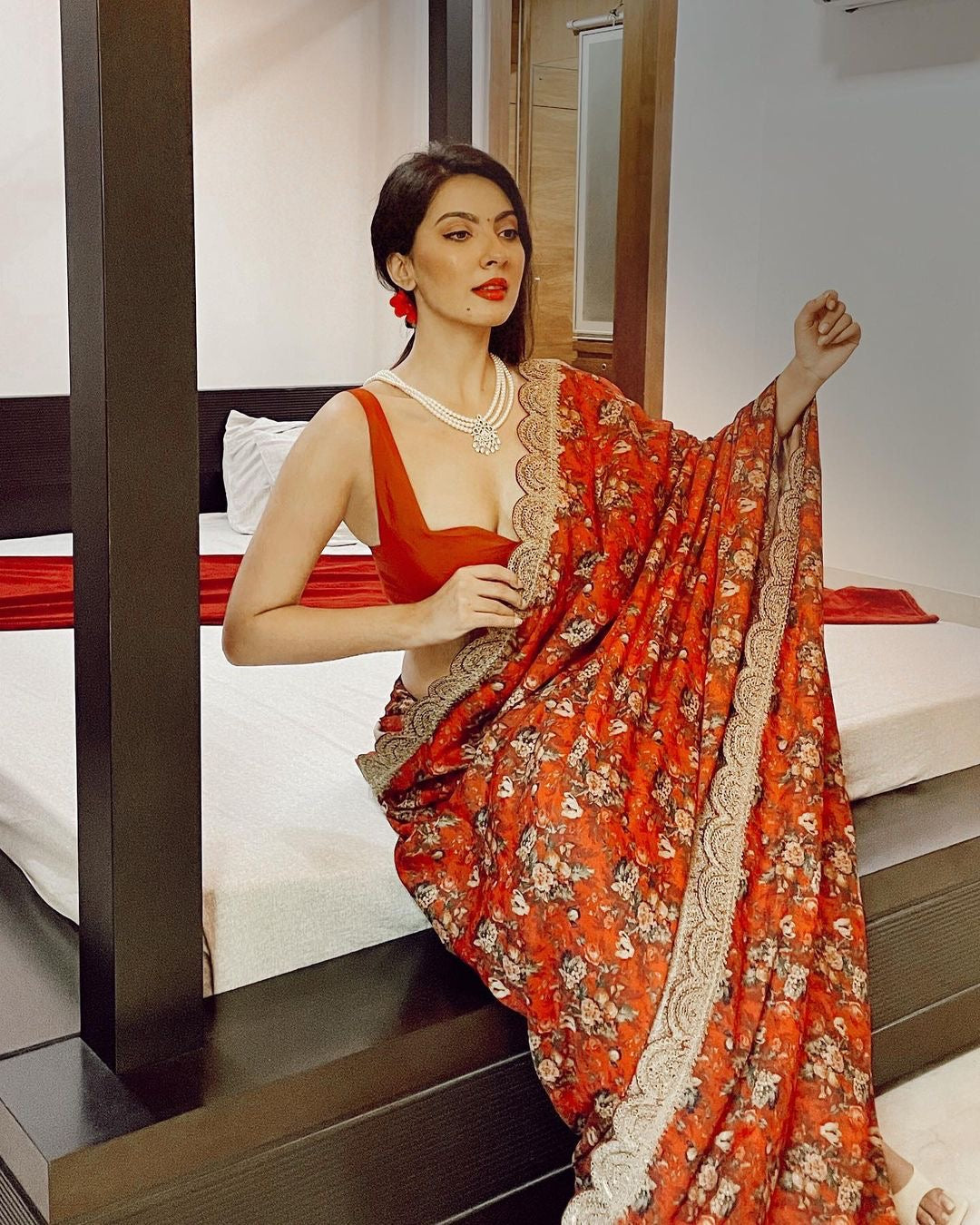 Nikki Mehra in Crimson Red Marori Work Print Saree