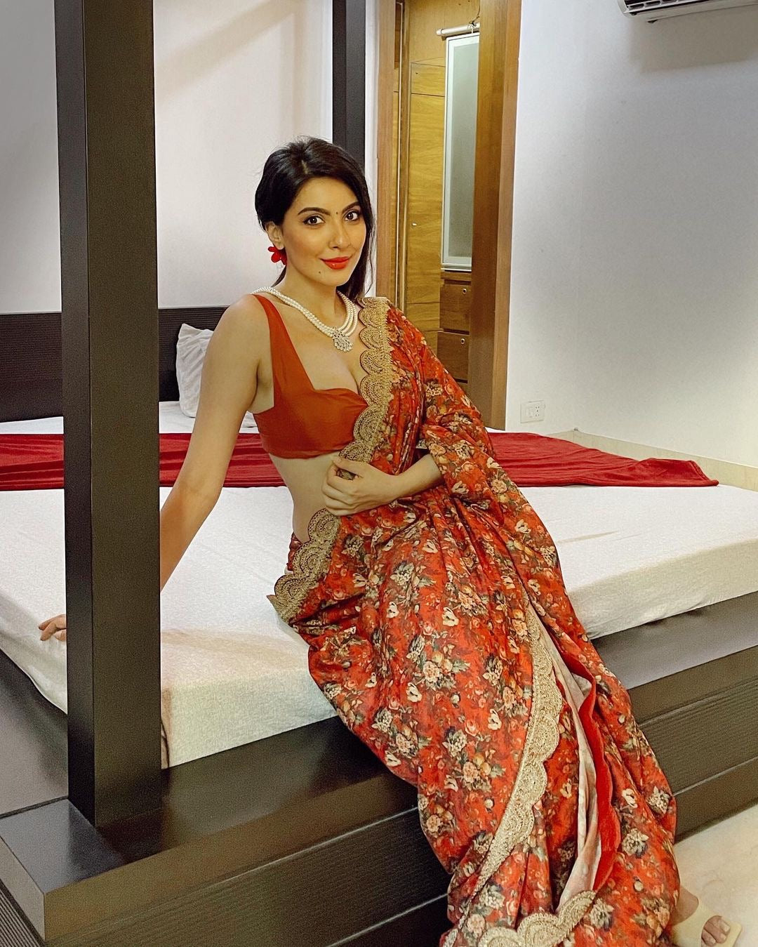 Nikki Mehra in Crimson Red Marori Work Print Saree