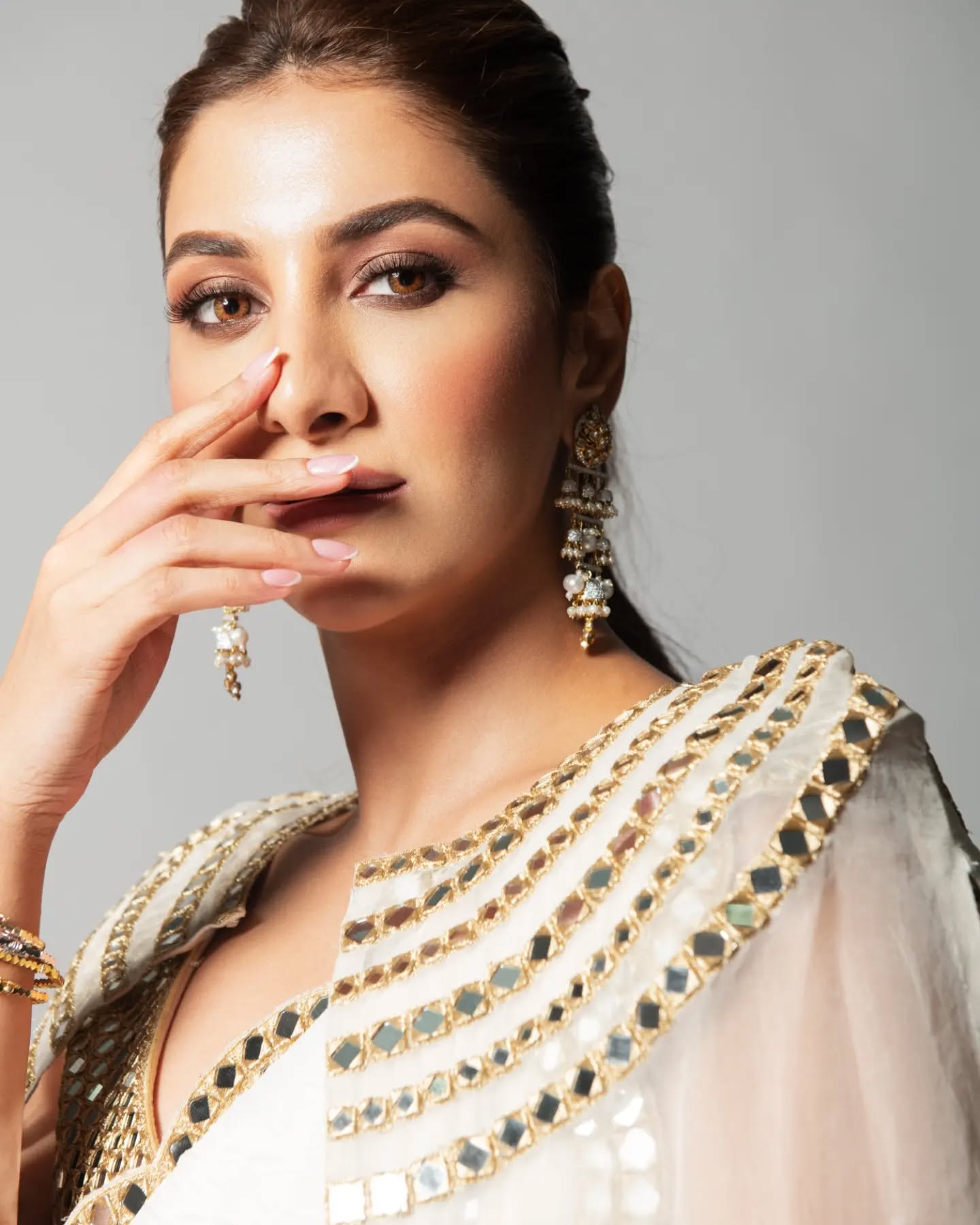 Rukmini Maitra in ivory pre draped mirror cape saree