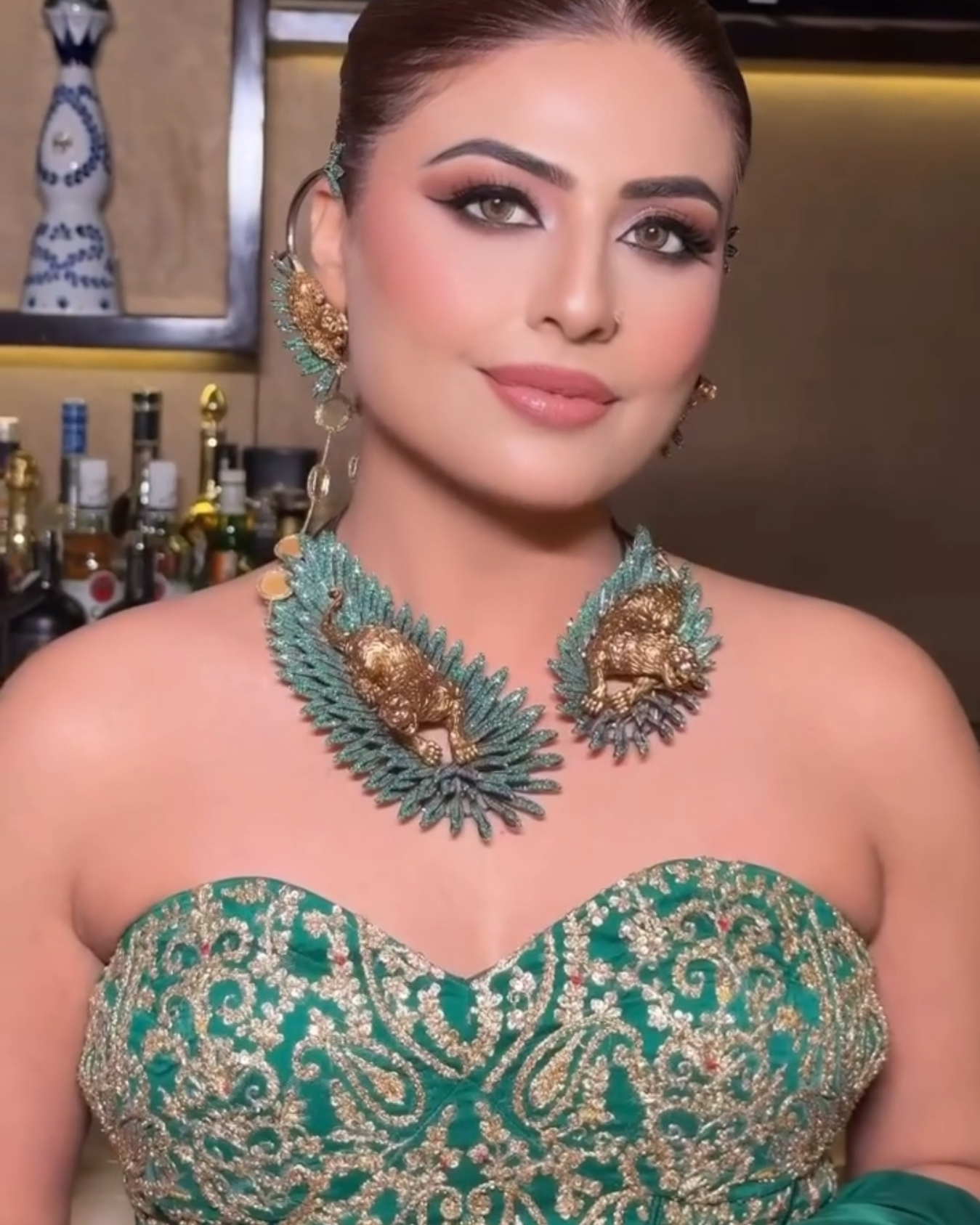 Aastha Nagpal in EMERALD GREEN HEAVY CORSET DRAPED SAREE SET