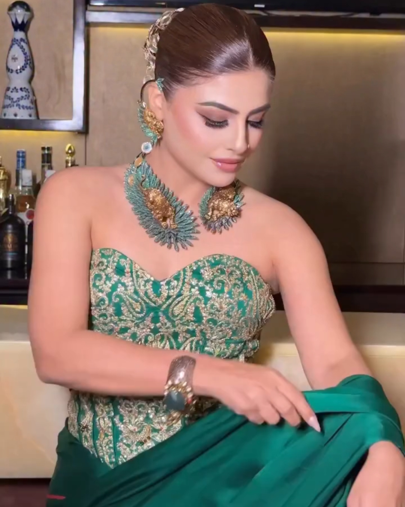 Aastha Nagpal in EMERALD GREEN HEAVY CORSET DRAPED SAREE SET