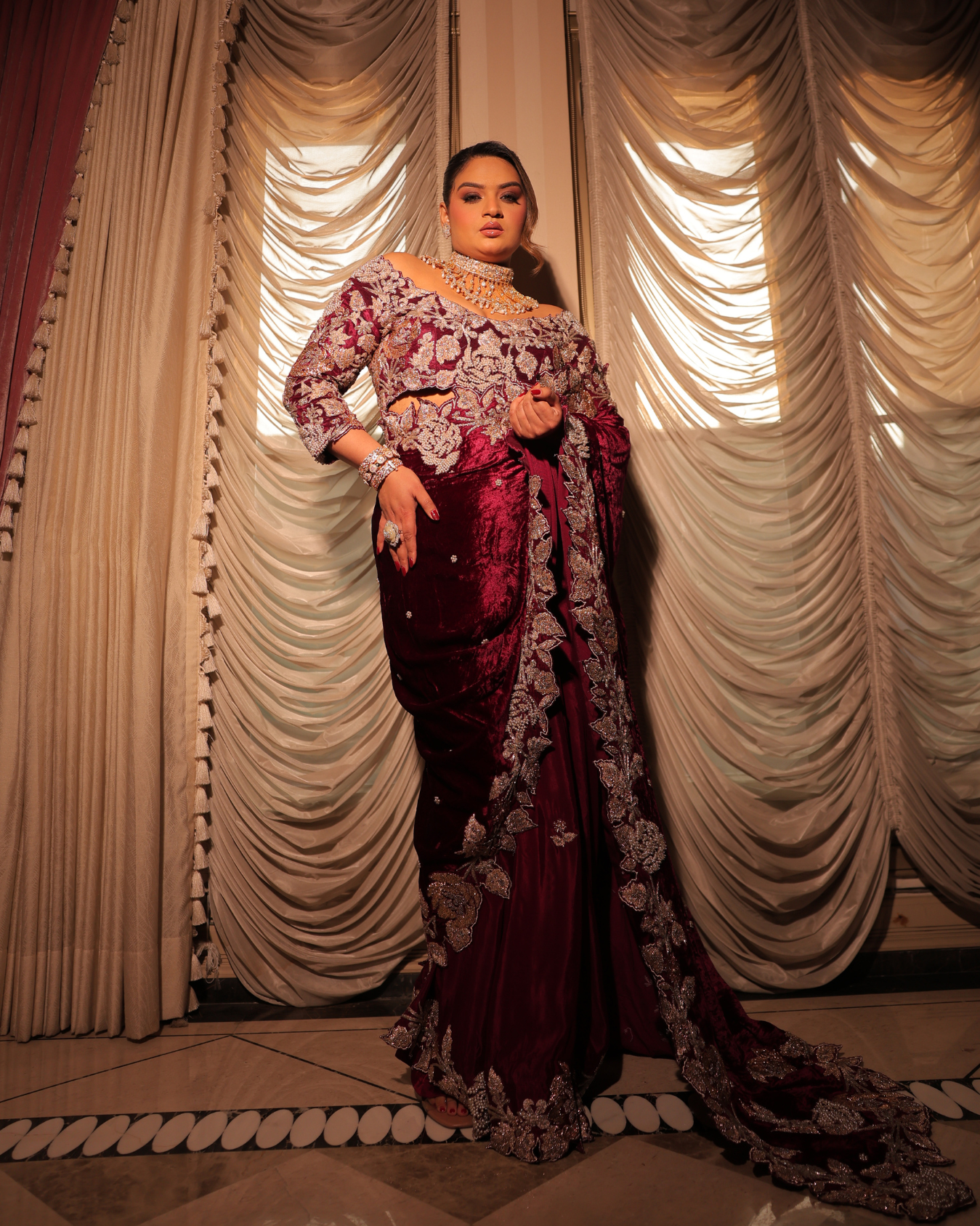 Rini in Burgundy wine velvet saree