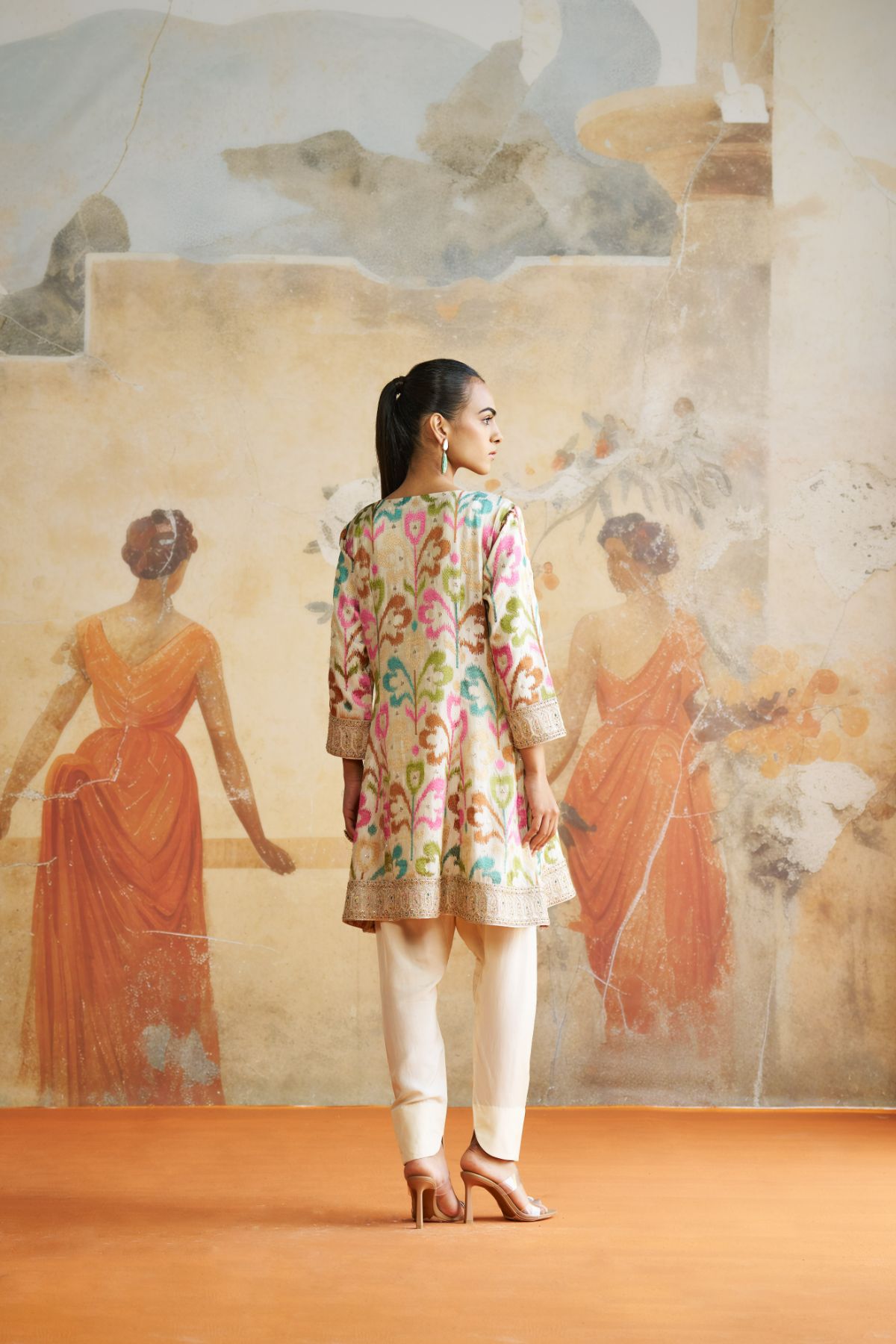 Ikkat peplum short kurta set.