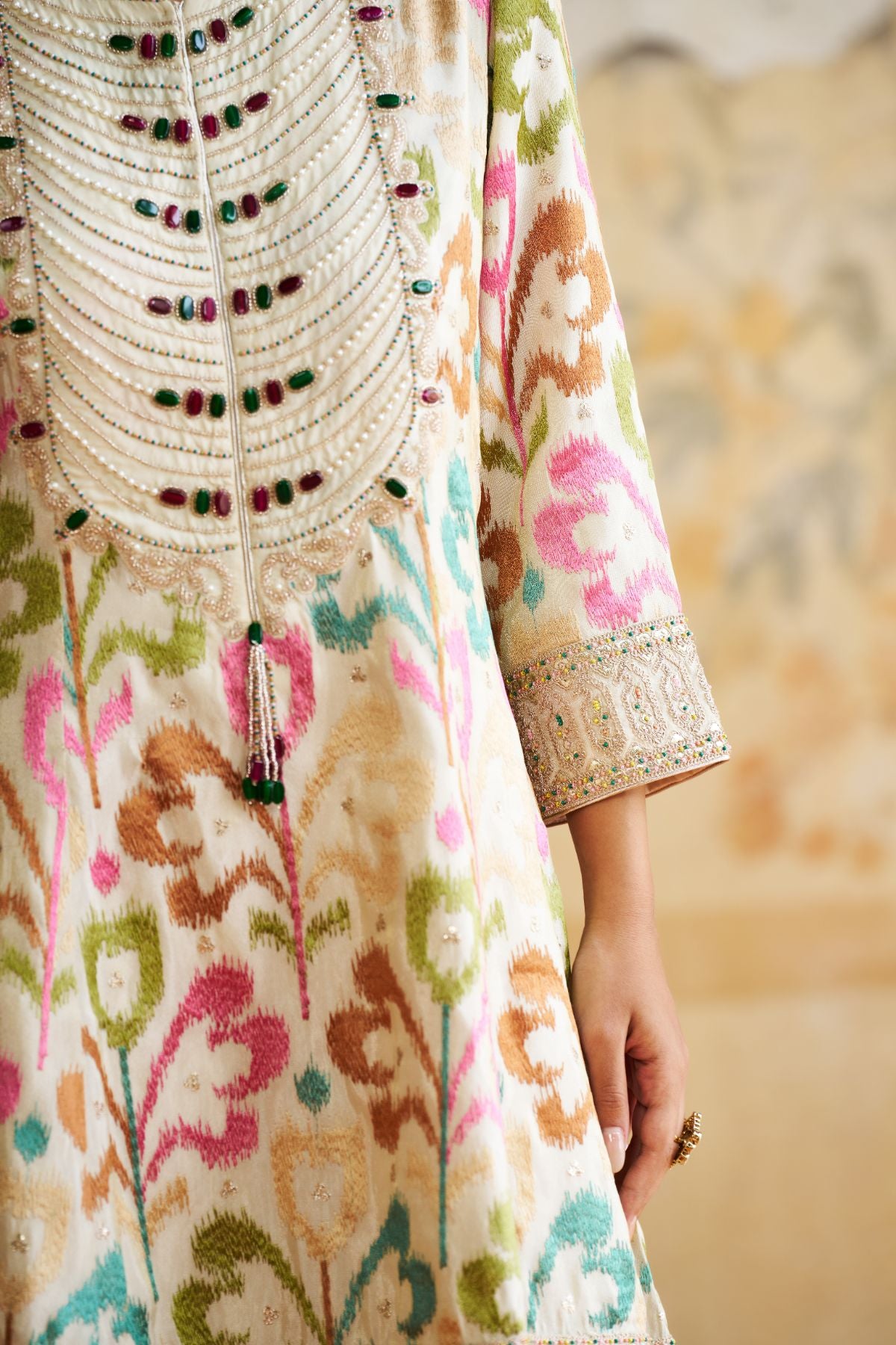 Ikkat peplum short kurta set.