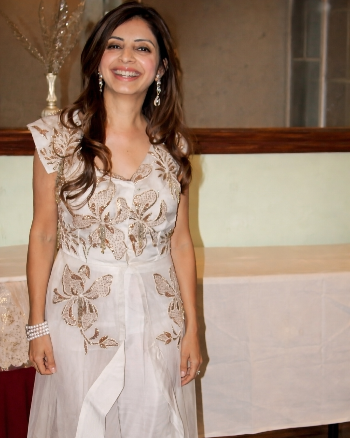 Ayesha Vohra in Ivory asymetrical jacket set