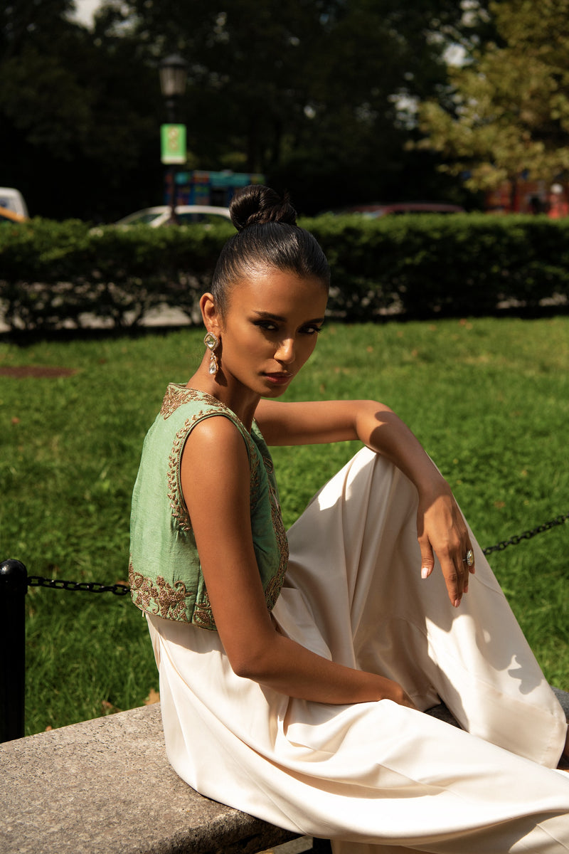 Ivory flared jumpsuit with embroidered jade green bolero Aashima