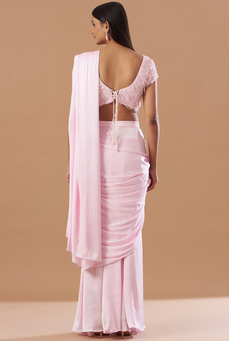 Blush Pink chinnon pre-draped saree with tassel work blouse