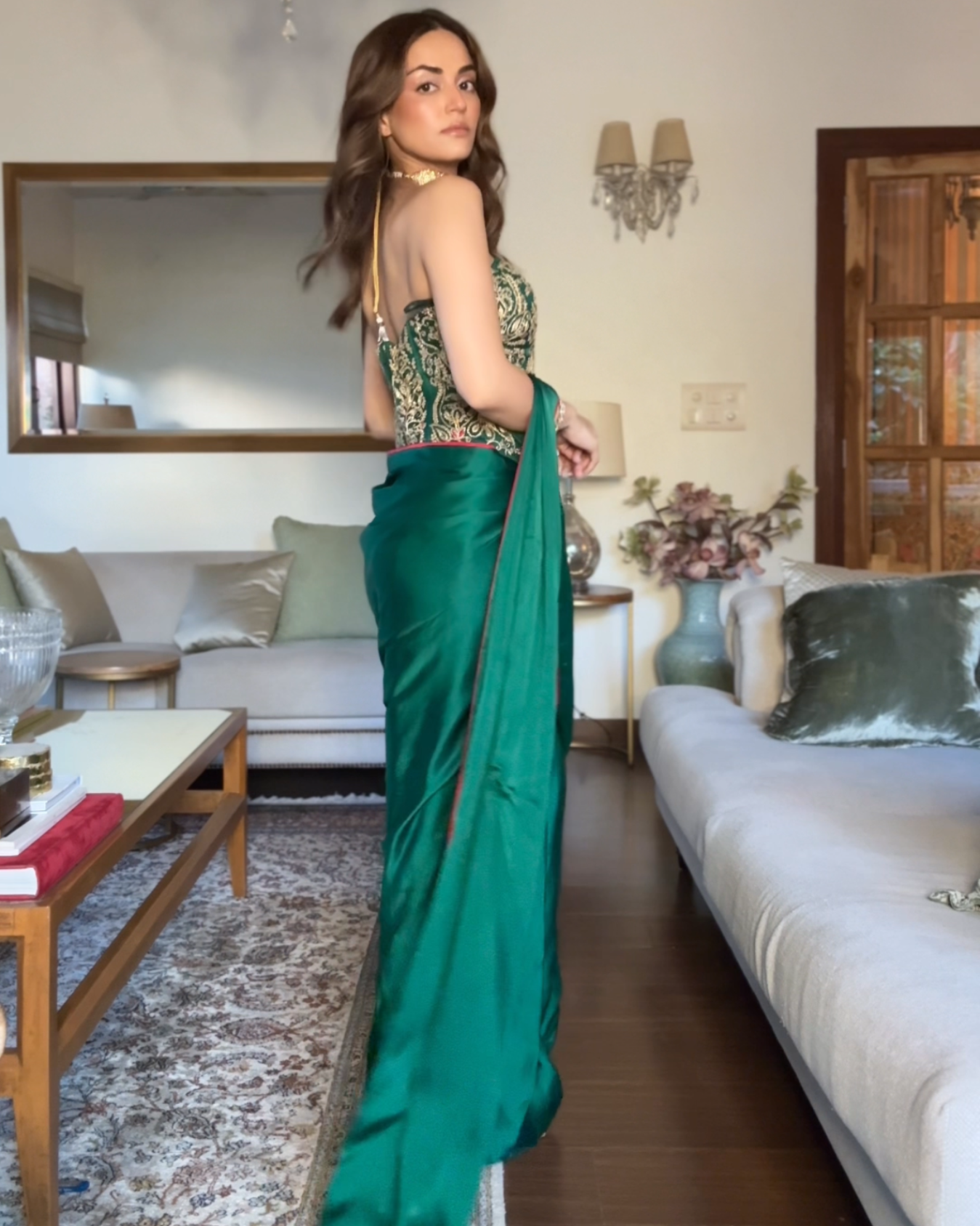 Mehak Bakshi in EMERALD GREEN HEAVY CORSET DRAPED SAREE SET