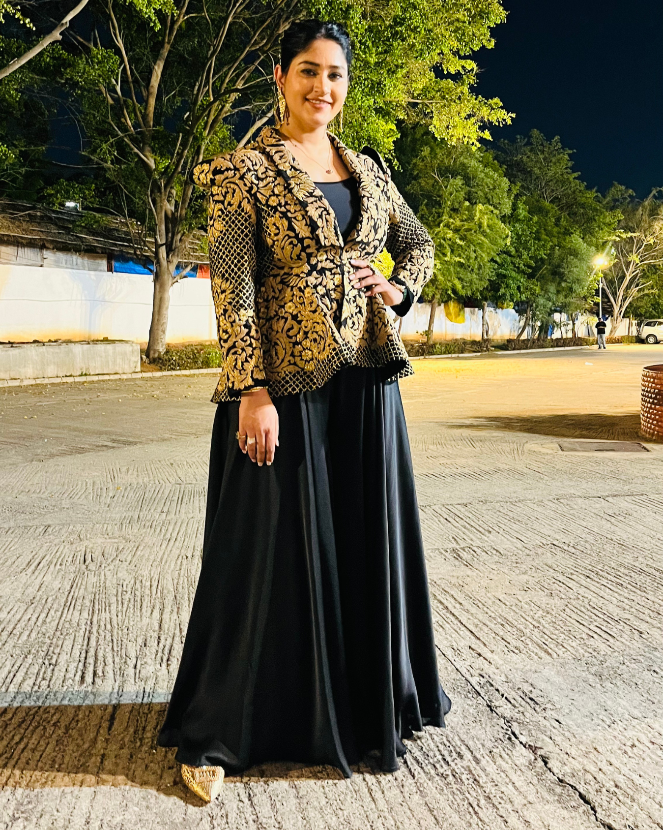 PRATIBHA SINGH in Zoe black peplum jacket set.