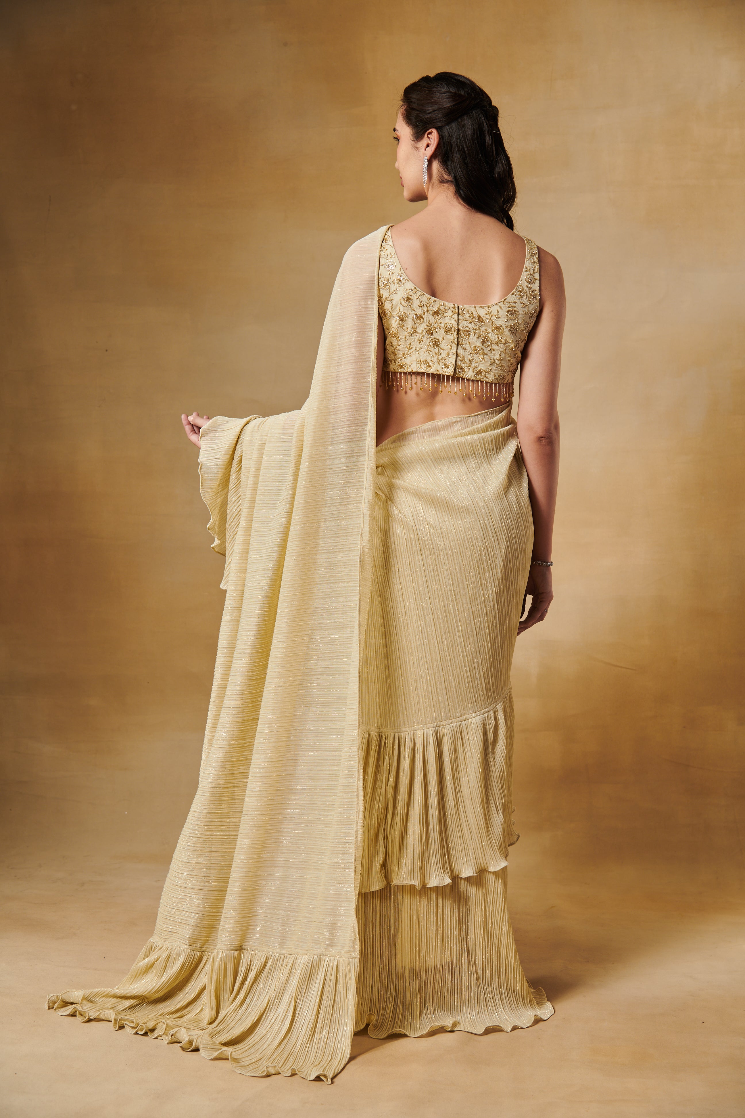Light gold beaded embroidery ruffle saree
