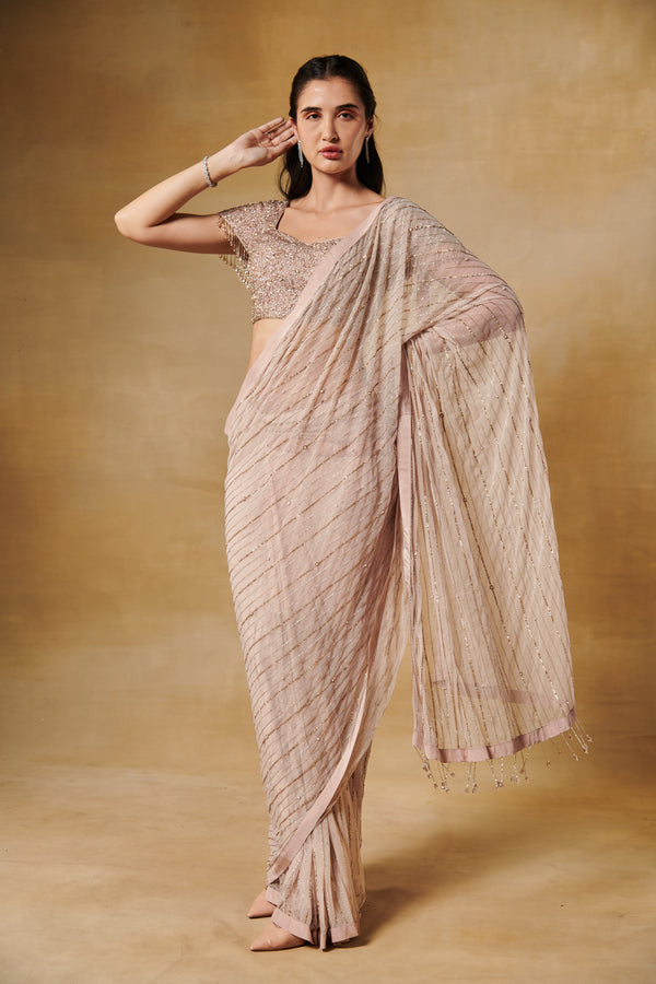 Champagne beige blush pre draped saree with heavy embroidery sequence blouse