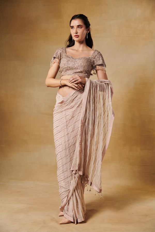 Champagne beige blush pre draped saree with heavy embroidery sequence blouse