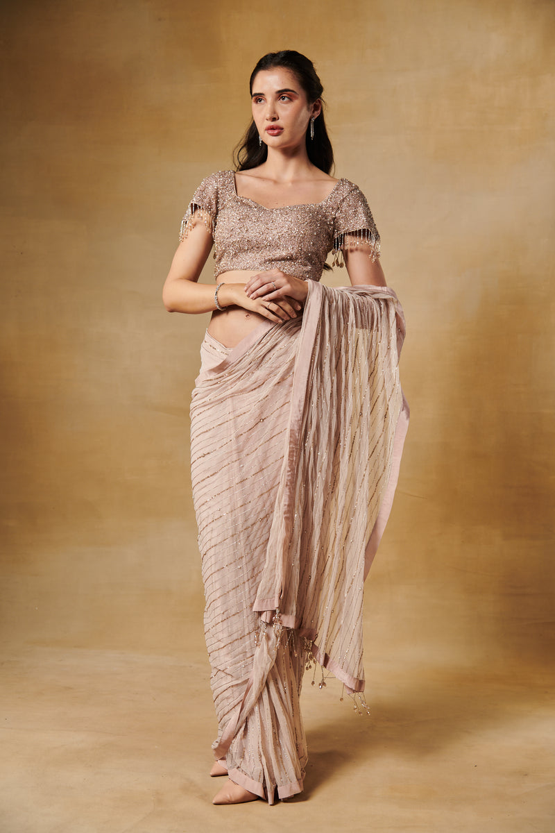 Champagne beige blush pre draped saree with heavy embroidery sequence blouse