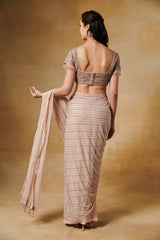 Champagne beige blush pre draped saree with heavy embroidery sequence blouse