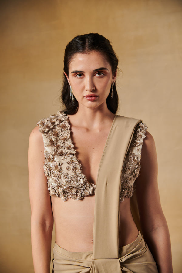 Tan beige ruffle layered predraped saree with 3D flowers blouse