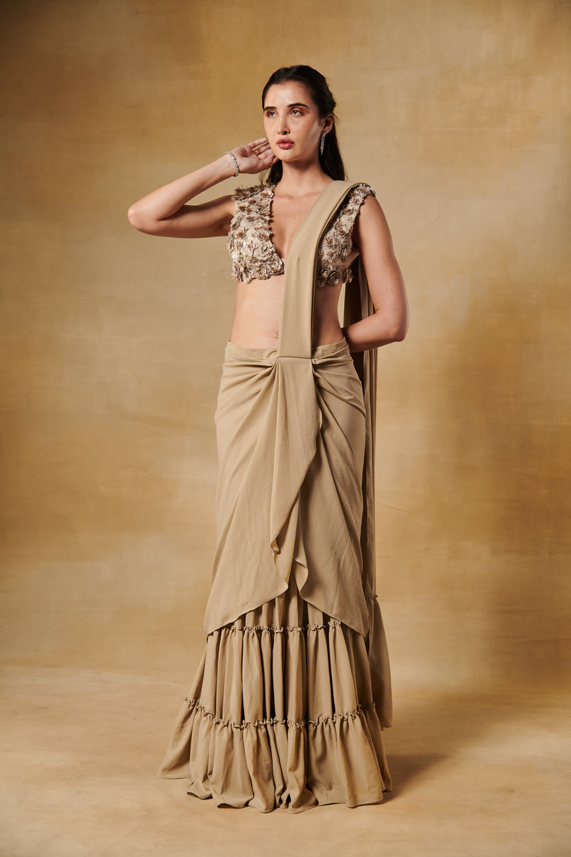 Tan beige ruffle layered predraped saree with 3D flowers blouse