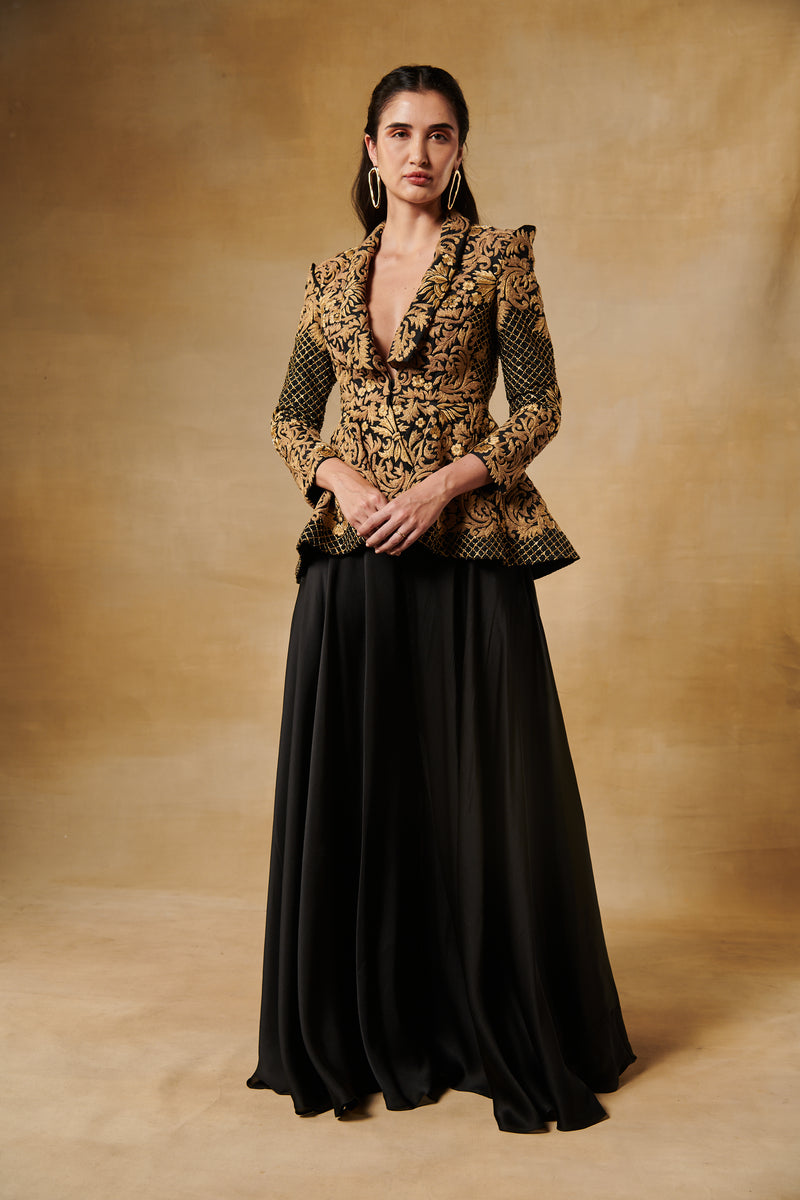 Midnight black peplum antique gold jacket with flared georgette sharara pants.