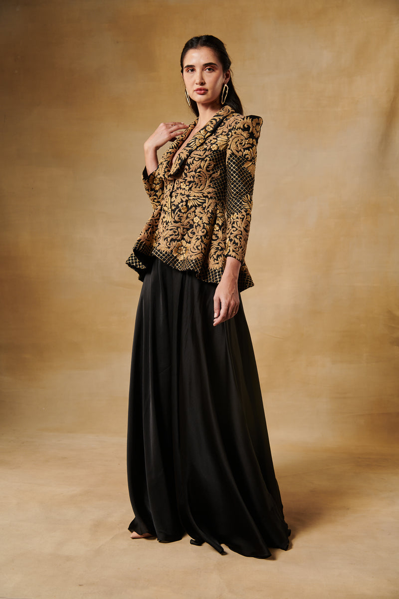 Midnight black peplum antique gold jacket with flared georgette sharara pants.