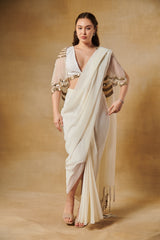Shell white pre draped saree set layered with mirror work cape.