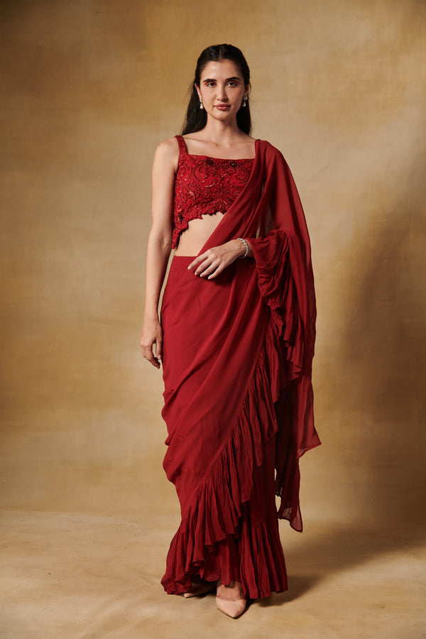 Barn red beaded blouse with ruffle pre draped saree
