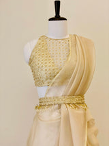 Champagne drape saree with pants and pearl work belt